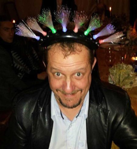 Chris Fielden wearing silly lights tiara on his head