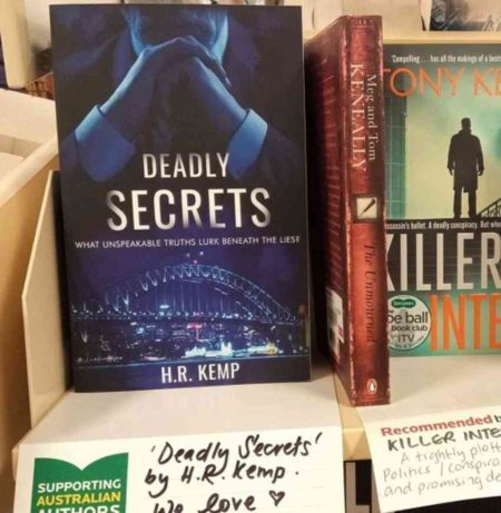 Deadly Secrets on a shelf in a bookshop