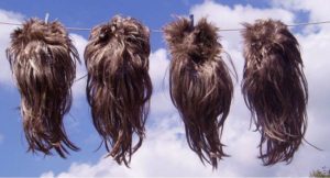 Ye Gods! 4 mullet wigs on a washing line